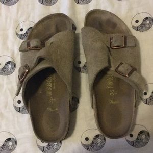 Birkenstocks with rose gold buckles